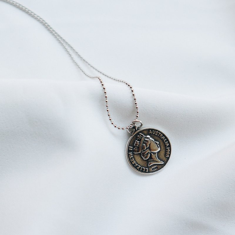 Vintage distressed dollar round coin pendant long necklace